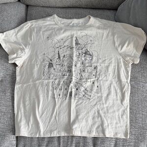 Official Taylor Swift "How the Kingdom Lights Shined" cream baby t-shirt